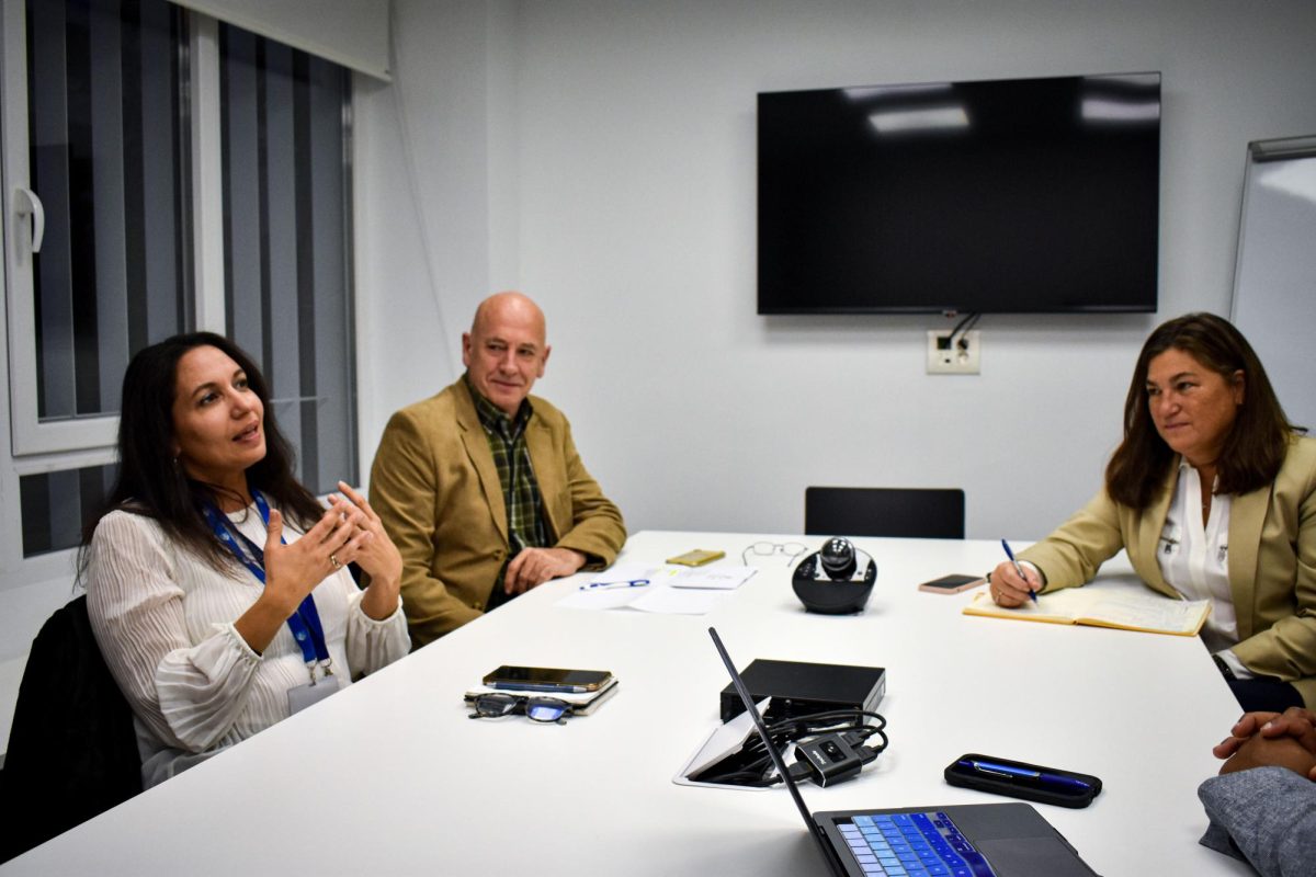 L-R: Interim Co-Directors Laurie Mazzuca, Francisco García Serrano and Victoria Villareal during a meeting at Manresa Hall, which opened this semester.