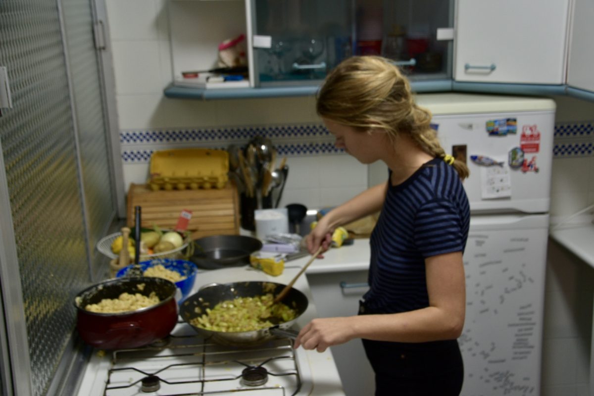 Olivia Wendell cooks for a Thanksgiving meal with friends.