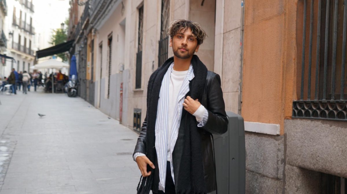 Anuj Gandhi with a black thrifted leather jacket he thrifted in Madrid alongside a women’s suit jacket that he uses as a shirt thrifted in Saint Louis. He knew exactly how to pose during this five-second photoshoot, which was terrifyingly admirable.