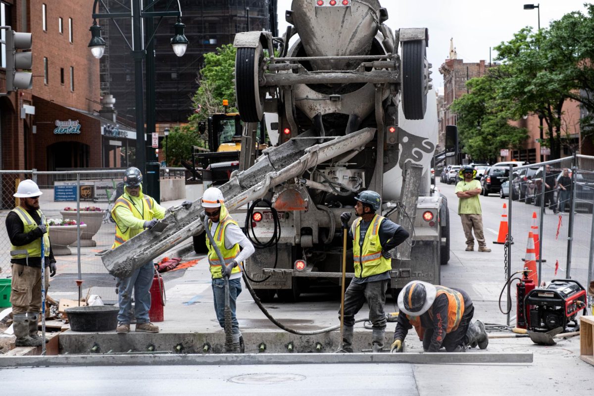 A construction crew pour concrete at a site on 16th Street in Denver, Colordo. Click on photo for full view.