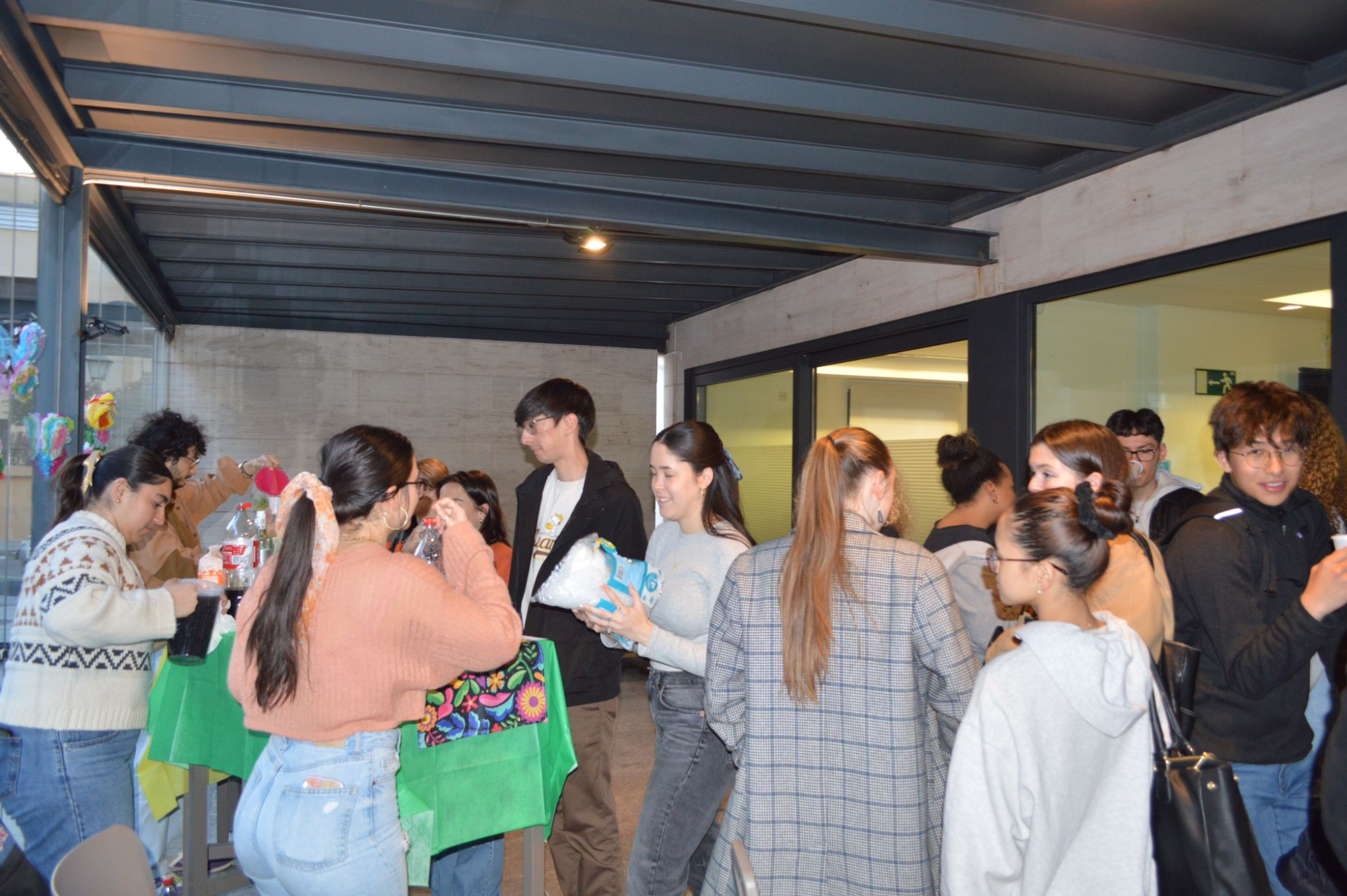 Students sipped Piña Coladas and Palomas in the cafeteria, colorfully decorated for the drink-tasting event