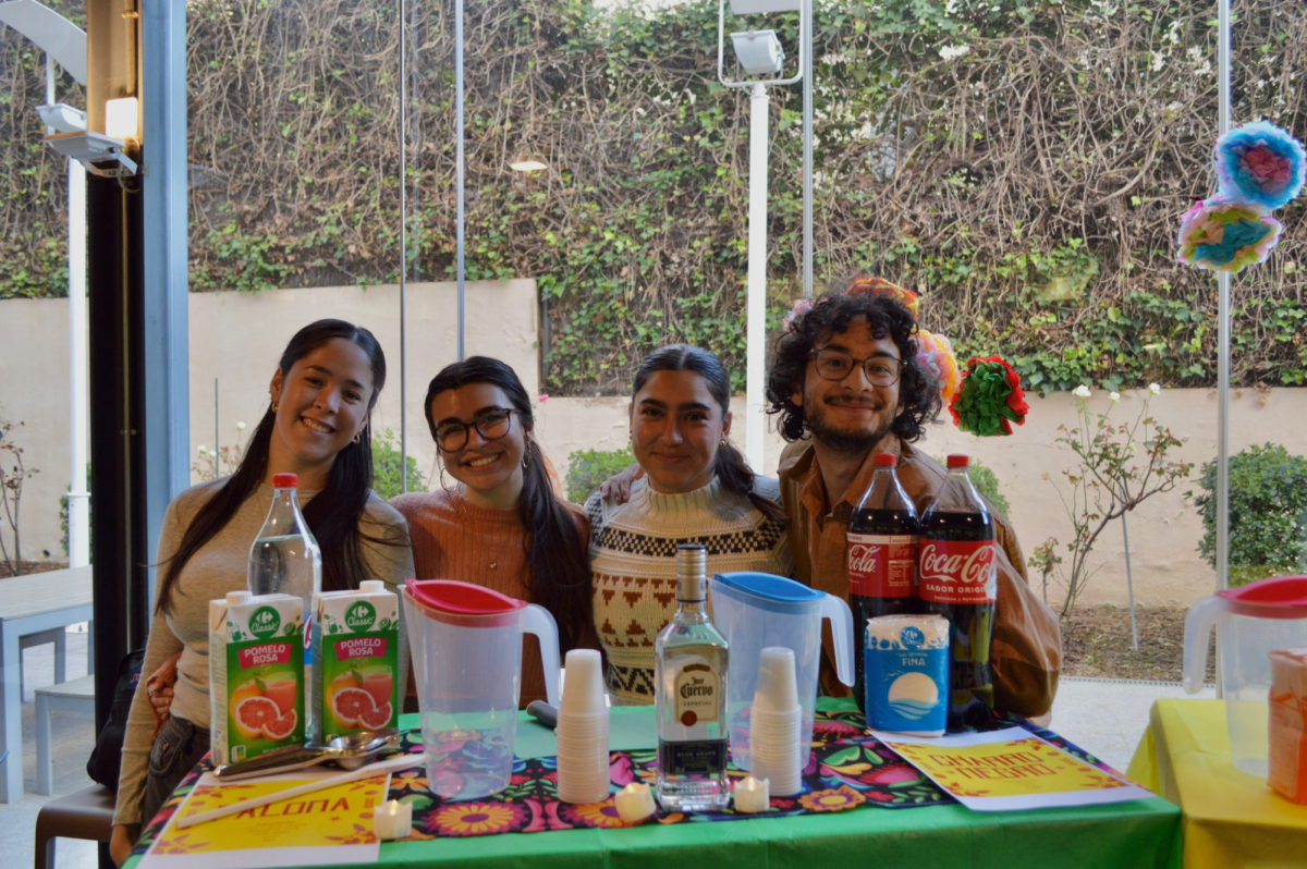 (L-R) Yeishaliz Cancel-Ortiz, Kayla Reyna, Victoria Flores, and Alejandro Moran at one of the drink-tasting stands at the LSU event. Reyna made the Paloma and Flores mixed the Charro Negro.