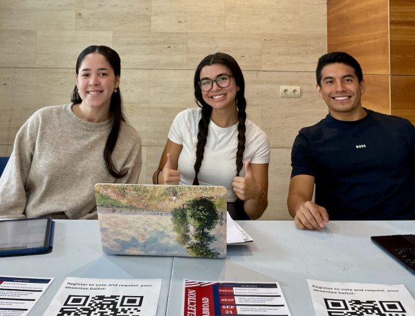 Representatives of SGA running the voter registration table in San Ignacio Hall's lobby.