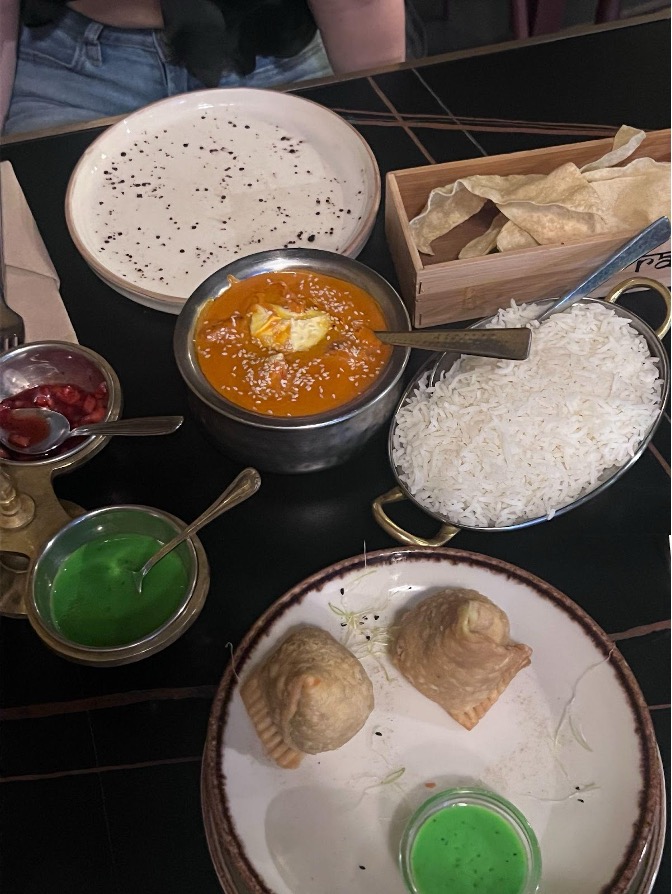Our restaurant critic dined on aloo samosas and butter chicken at Rangoli. 