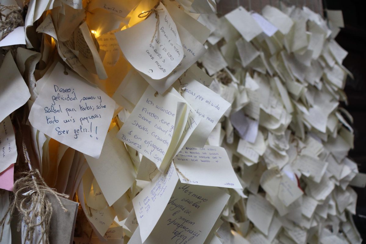 Now, people stop by the shop on their visits to Madrid to leave wishes like this one. The wishes often reflect positive hopes for the future, family and friends and the world.