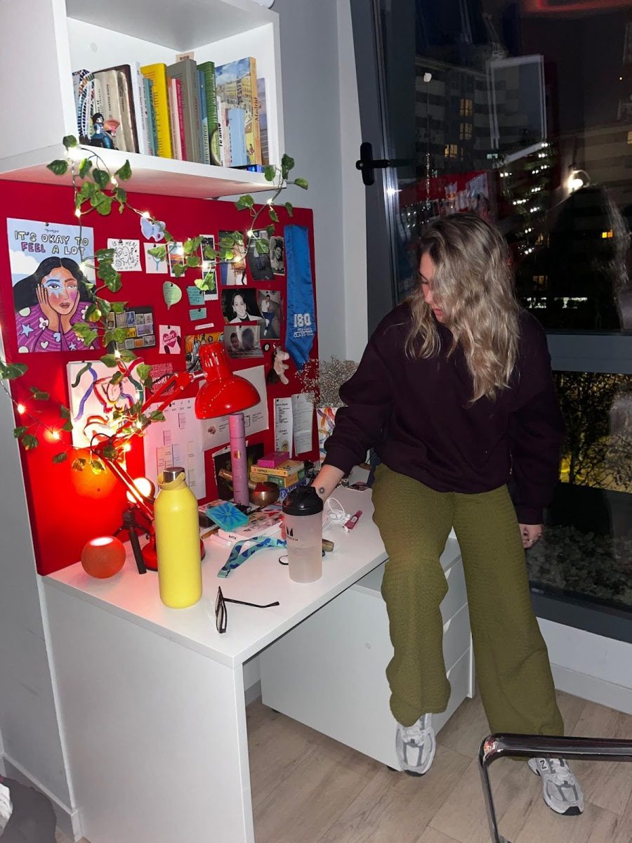 A "moderna," a student at Complutense in Madrid, chills in her dorm room.