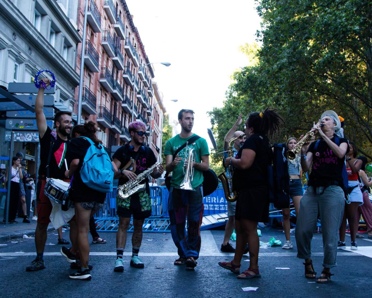 Musicians perform for pro-Palestine protesters at Paseo del Prado.