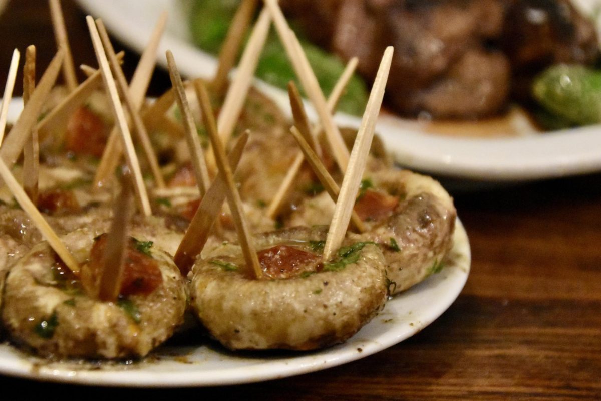 The Inn's specialty dish is grilled mushrooms with a piece of chorizo in the center which is served at the table, accompanied by another guest favorite, the solomillo and padrón peppers.