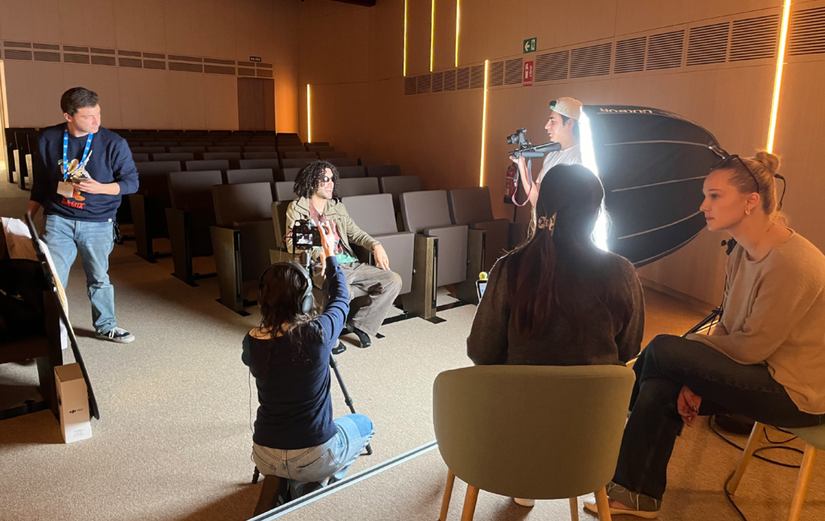 Students prepare Media Lab equipment for a photo shoot this fall. 
