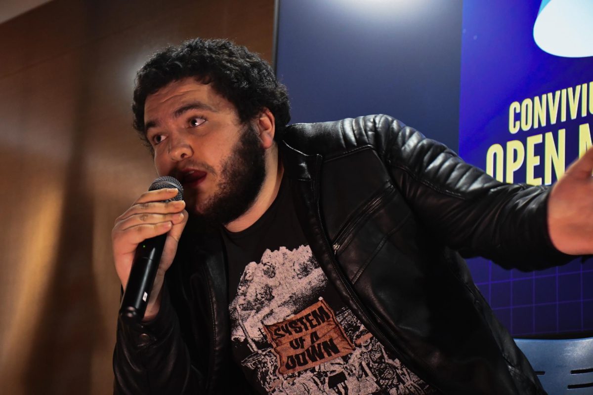 SLU-Madrid senior Alfonso Valdés, known affectionately as Fonsi, performs stand-up comedy at Convivium’s Open Mic last fall.